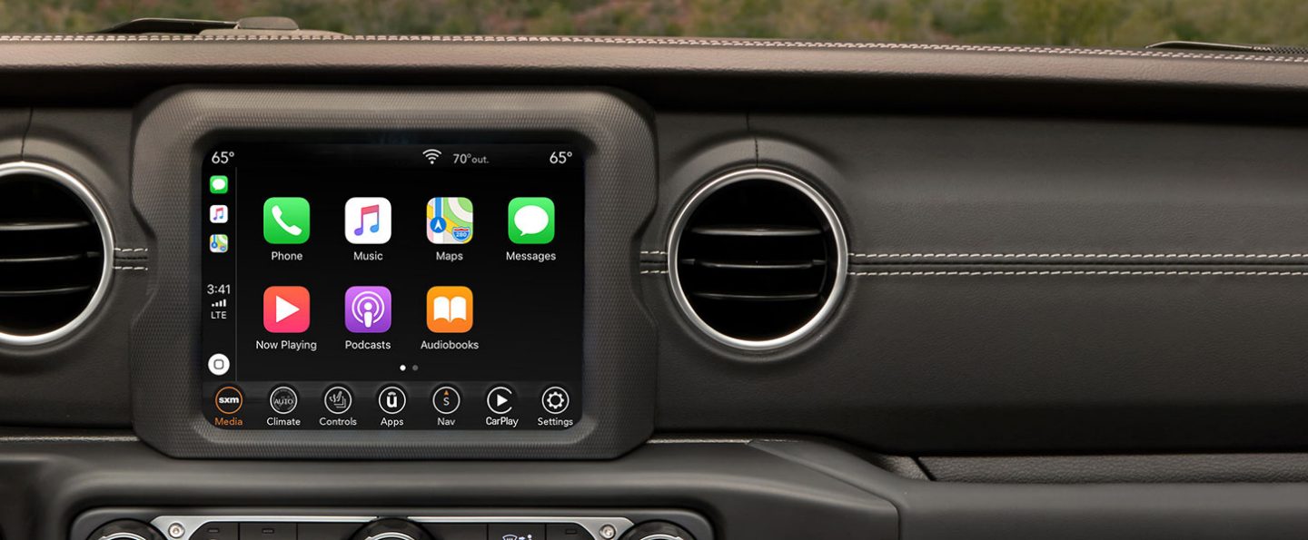 The touchscreen in the 2020 Jeep Wrangler showing Apple icons onscreen.